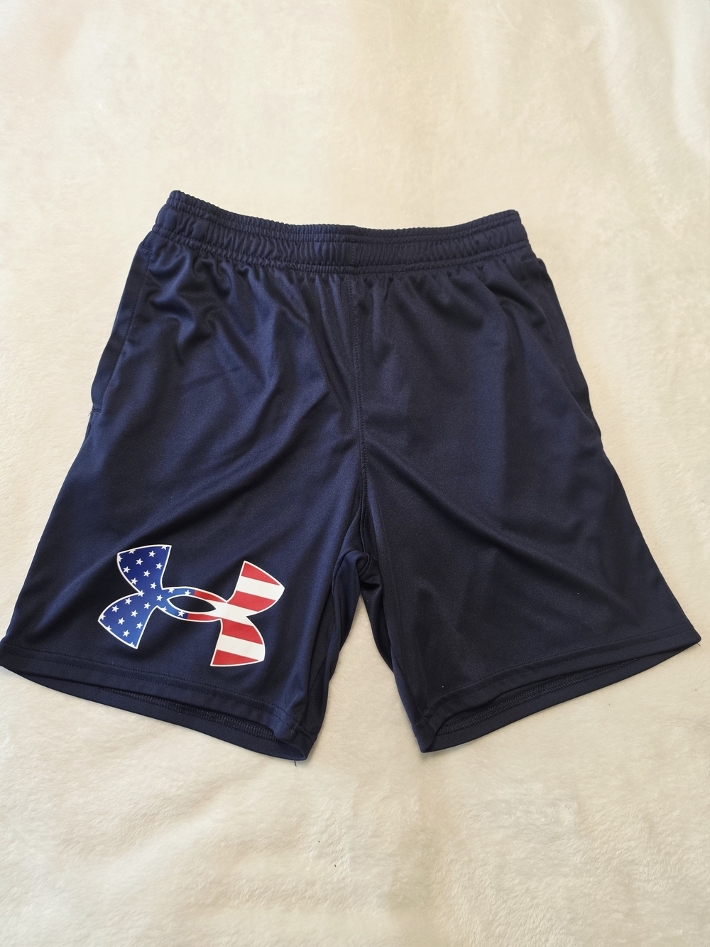 Under Armour Boy’s Navy Athletic Shorts with American Flag Logo